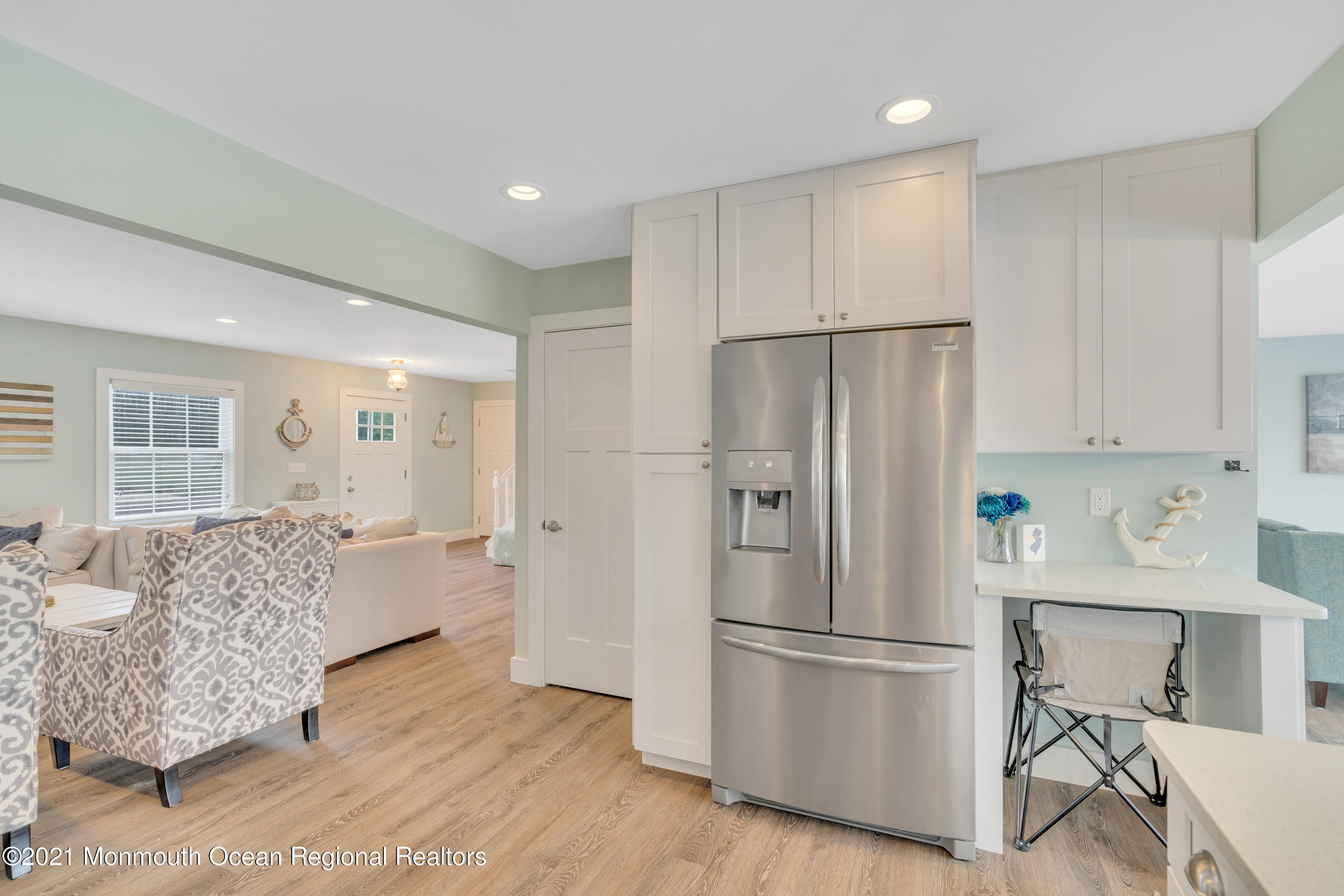 28 Harbor Inn Road Bayville, NJ 08721 - Photo 21 of 52 a kitchen with stainless steel appliances a refrigerator sink and wooden floor