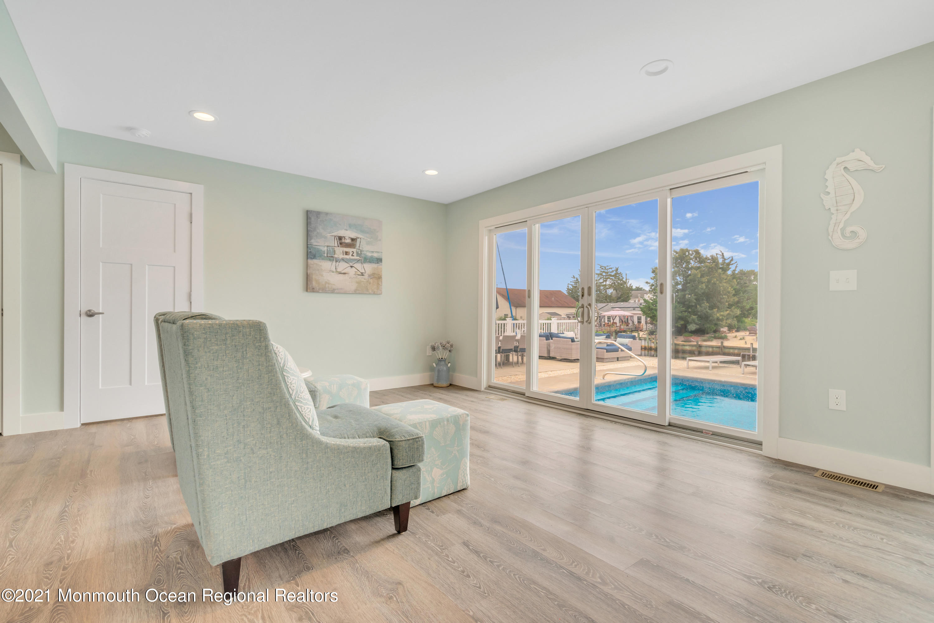 28 Harbor Inn Road Bayville, NJ 08721 - Photo 22 of 52 a living room with furniture and a large window