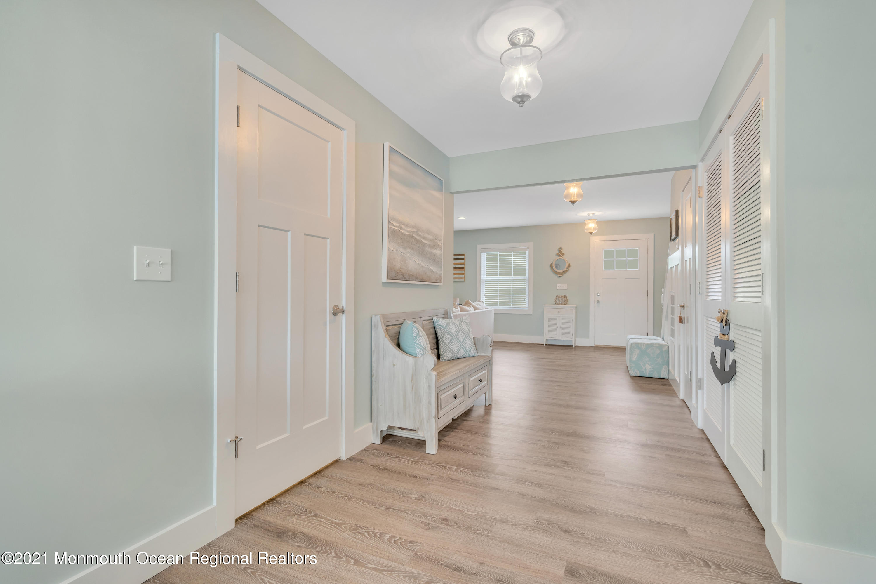 28 Harbor Inn Road Bayville, NJ 08721 - Photo 26 of 52 a view of a hallway with wooden floor