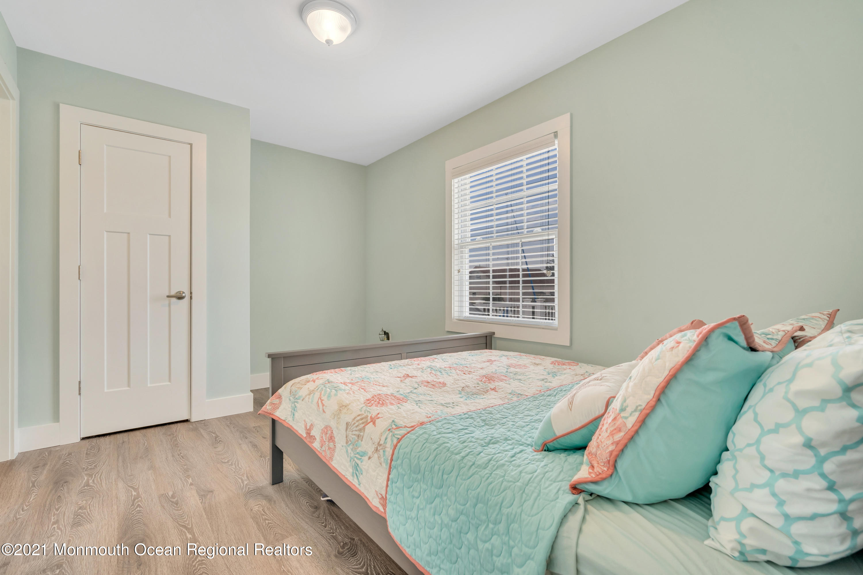 28 Harbor Inn Road Bayville, NJ 08721 - Photo 30 of 52 a bedroom with a bed and a window