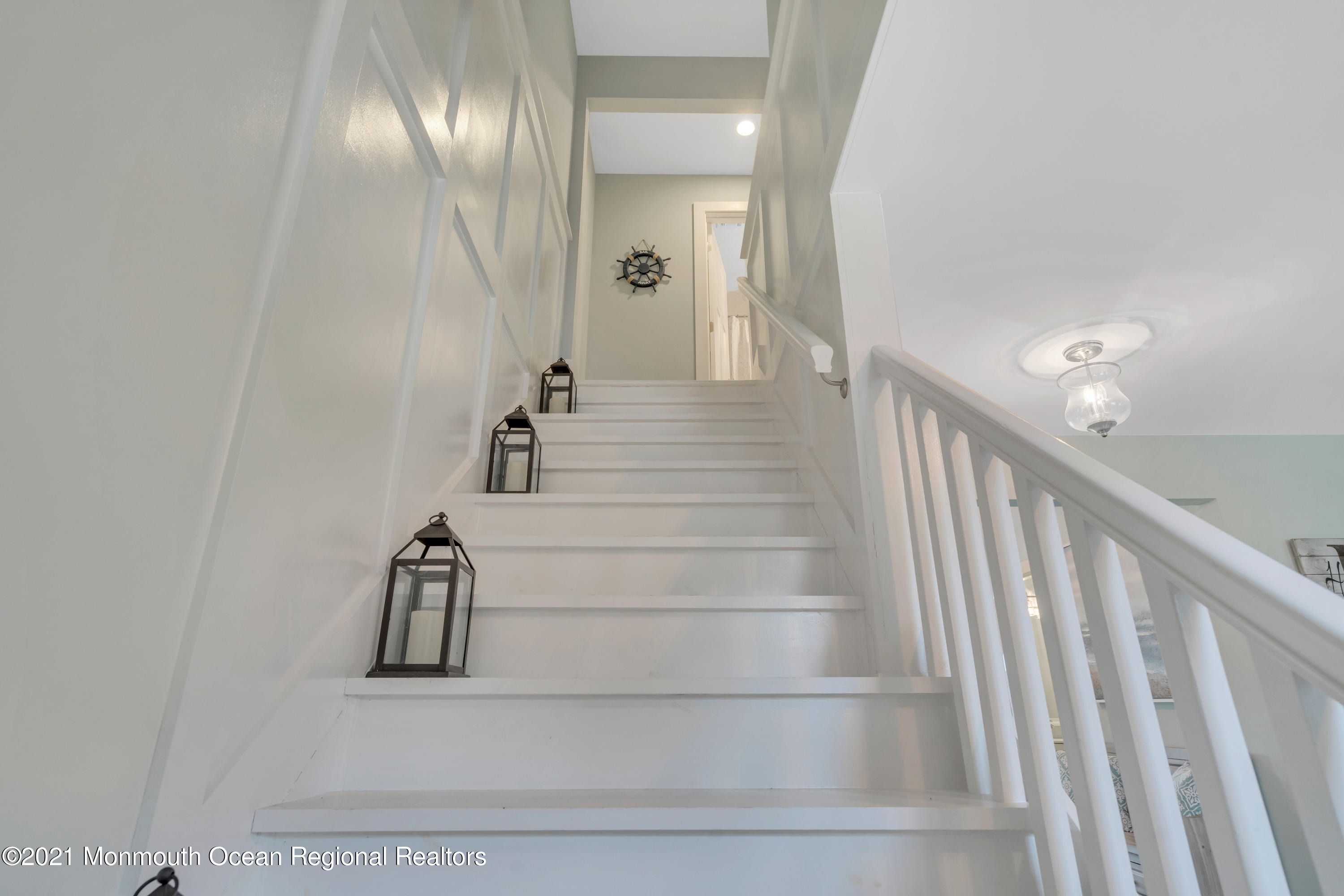 28 Harbor Inn Road Bayville, NJ 08721 - Photo 33 of 52 a view of staircase with white walls and railing