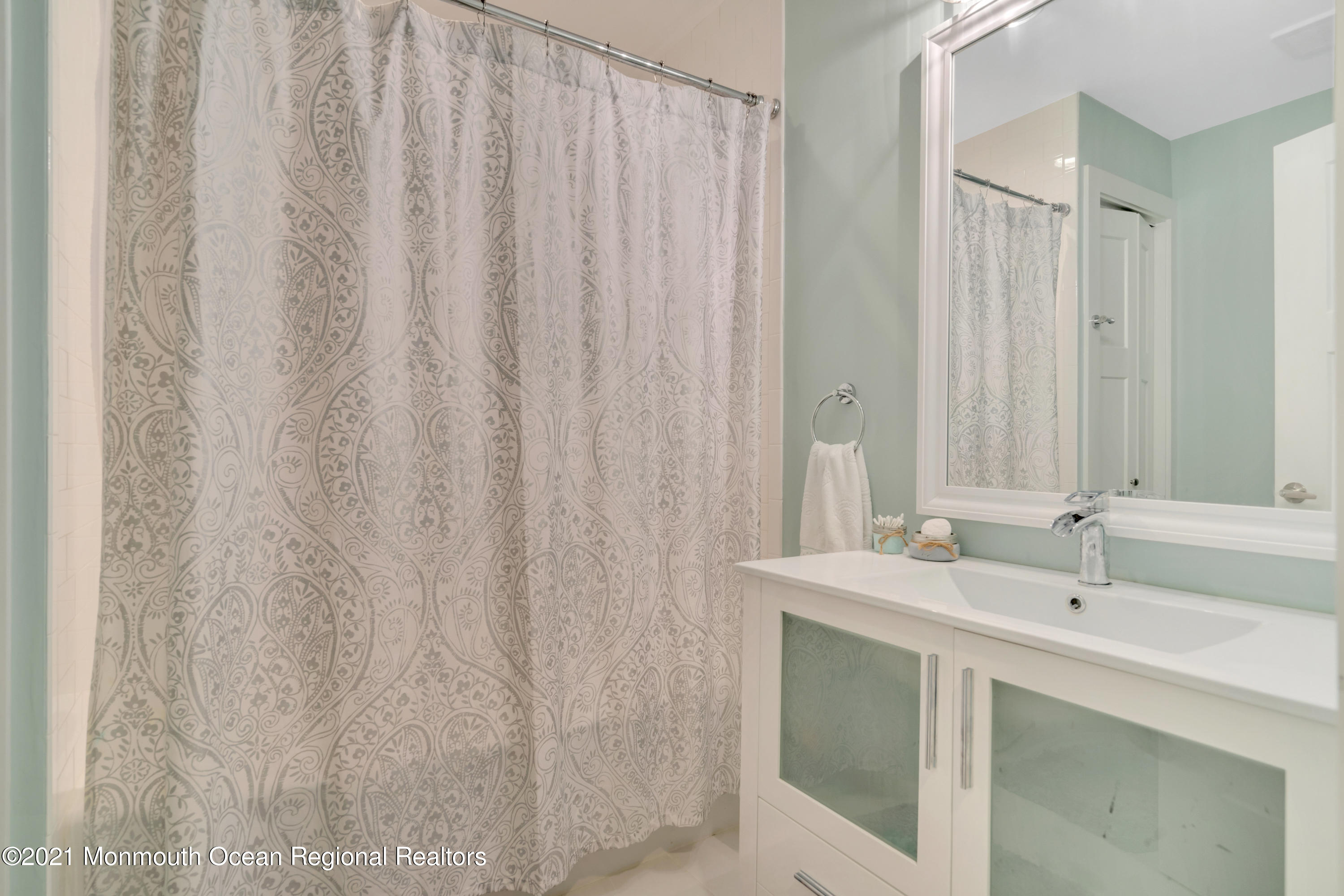 28 Harbor Inn Road Bayville, NJ 08721 - Photo 34 of 52 a bathroom with a sink and a mirror