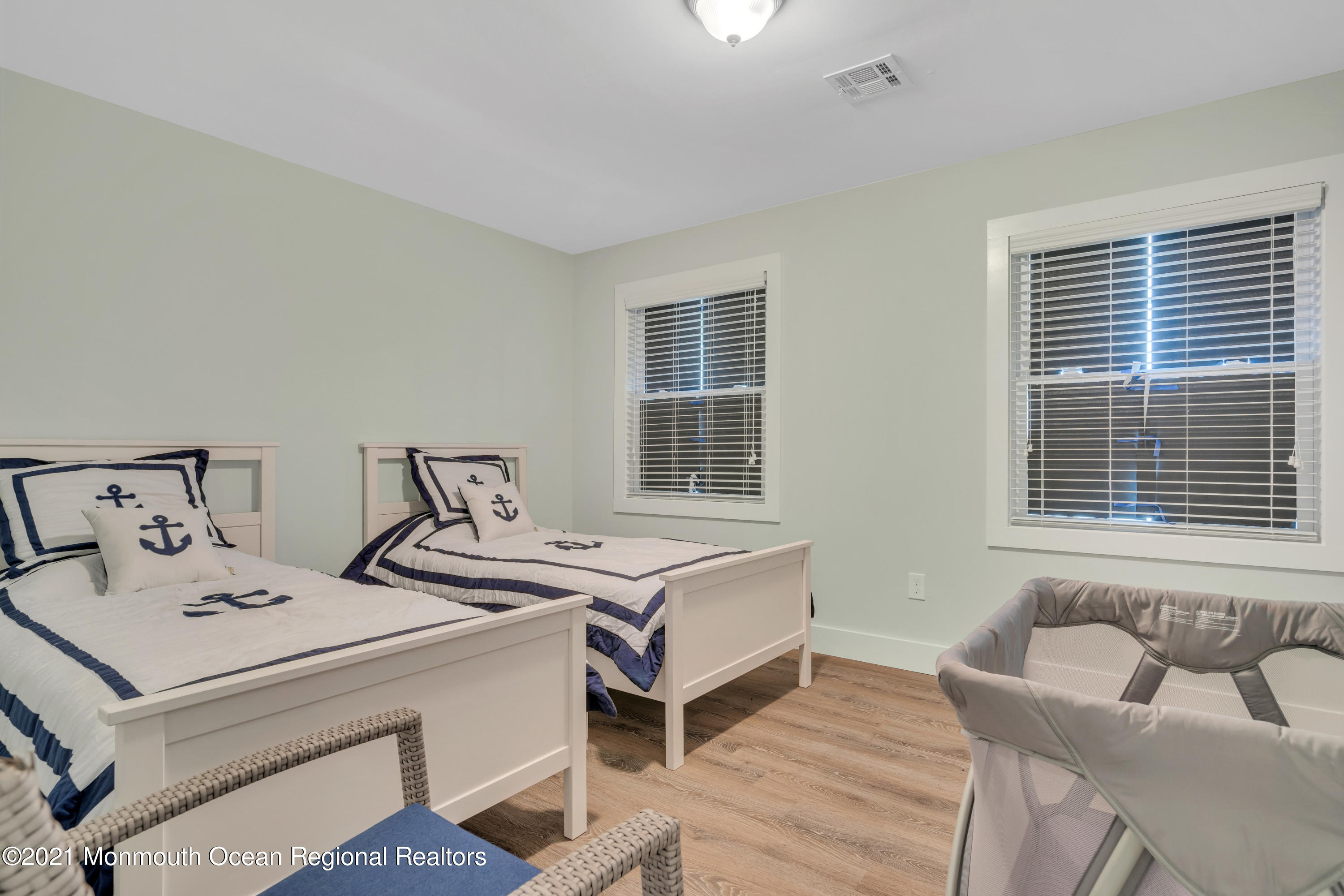 28 Harbor Inn Road Bayville, NJ 08721 - Photo 36 of 52 a bedroom with two beds and a window