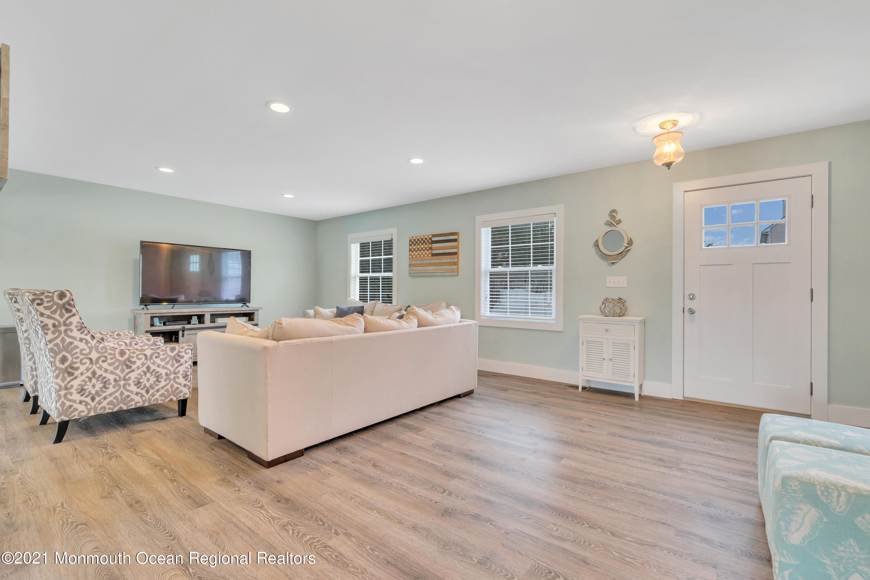 28 Harbor Inn Road Bayville, NJ 08721 - Photo 5 of 52 a living room with furniture and a flat screen tv