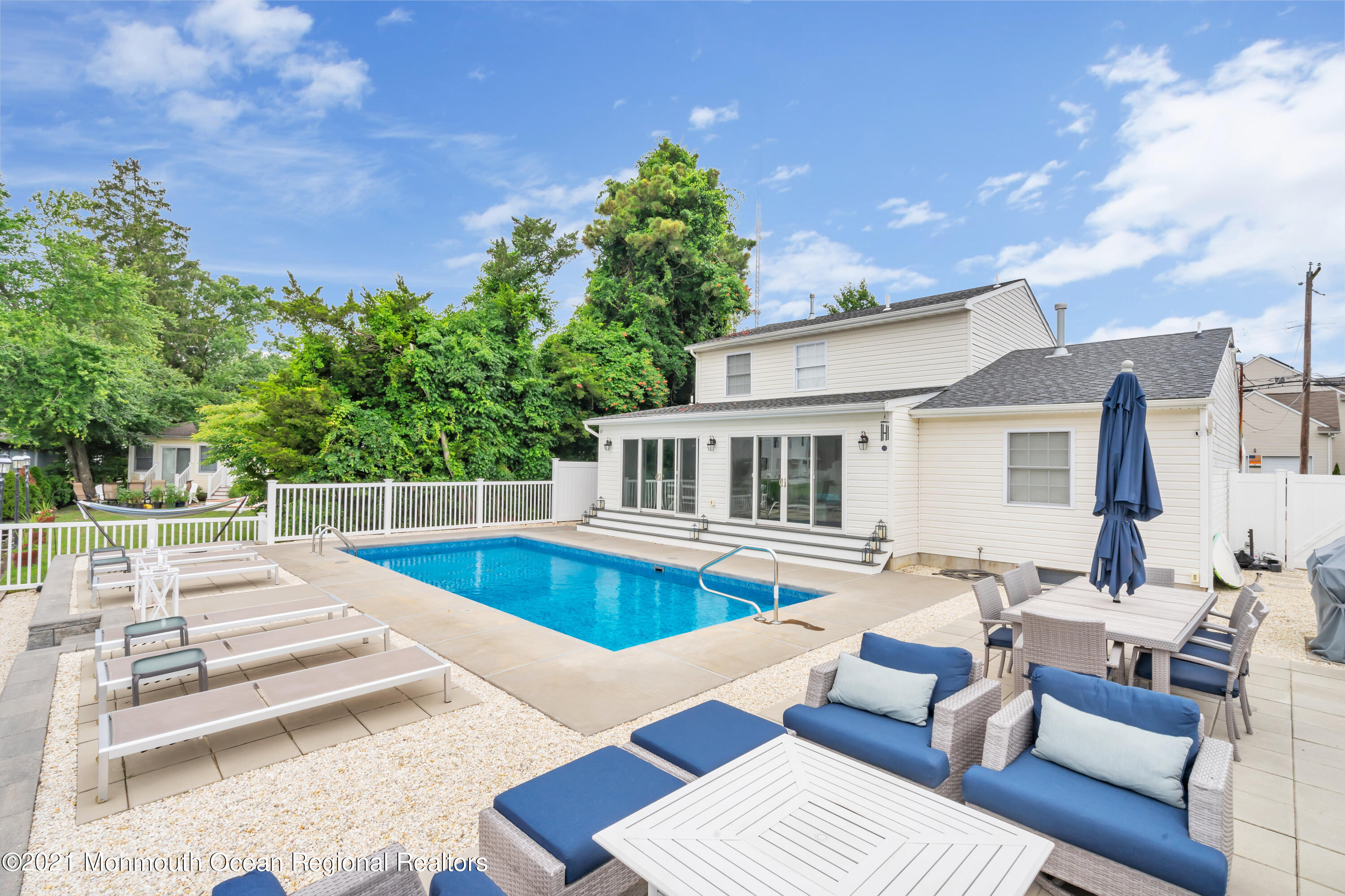 28 Harbor Inn Road Bayville, NJ 08721 - Photo 47 of 52 a view of a house with pool porch and sitting area