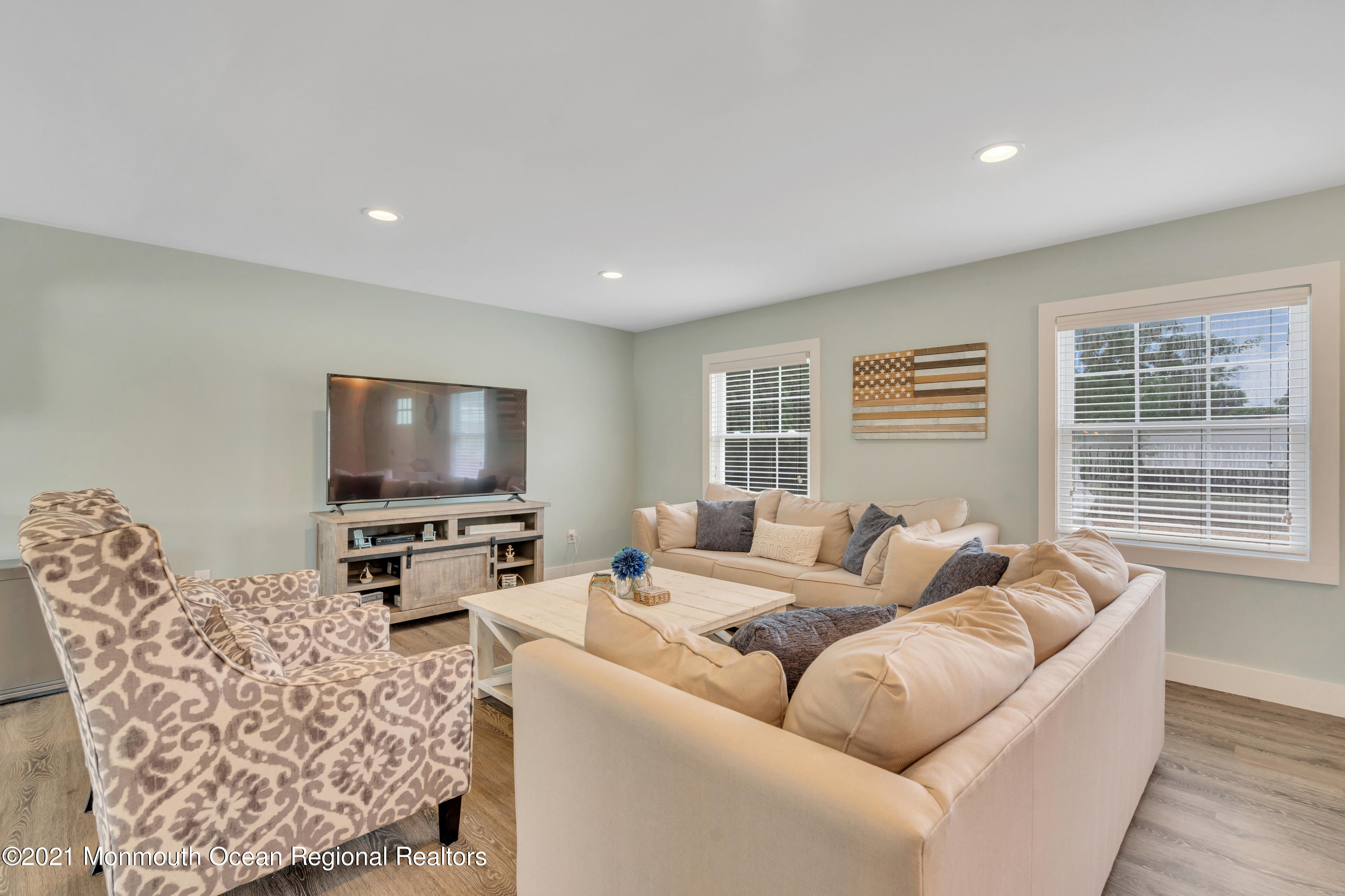 28 Harbor Inn Road Bayville, NJ 08721 - Photo 6 of 52 a living room with furniture and a flat screen tv