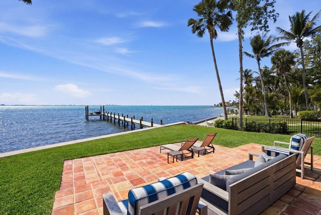 3127 Bay Shore Road Sarasota, FL 34234 - Photo 4 of 78 a view of a sitting area with furniture and lake view