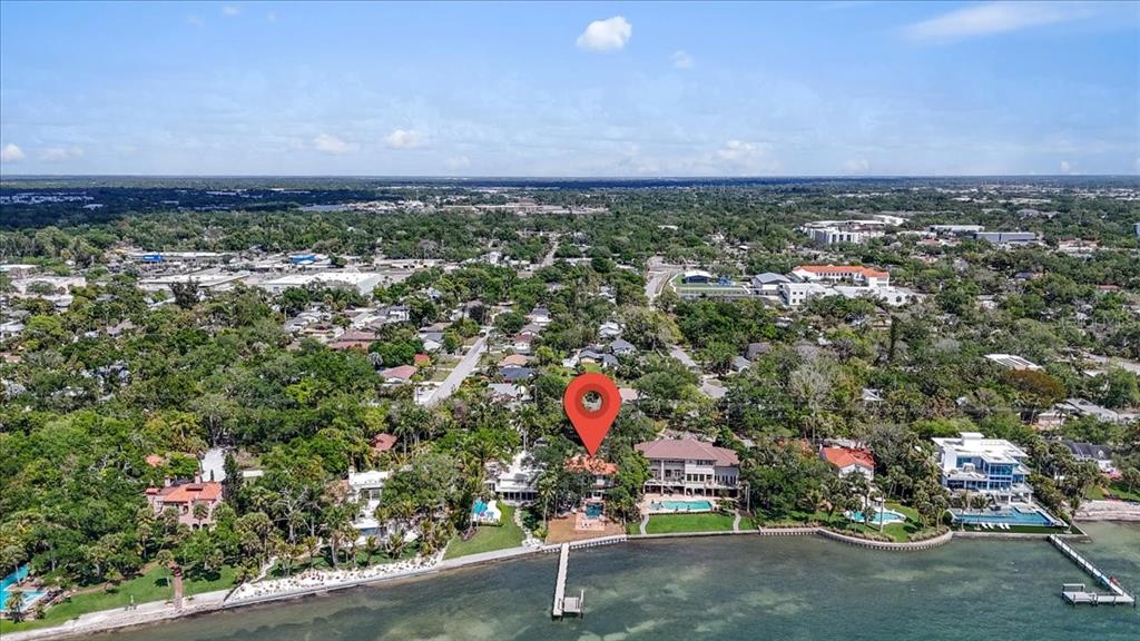 3127 Bay Shore Road Sarasota, FL 34234 - Photo 61 of 78 an aerial view of house with yard and mountain view in back