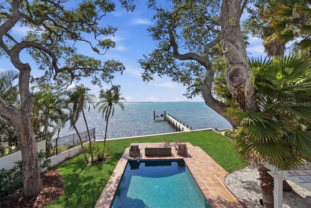 3127 Bay Shore Road Sarasota, FL 34234 - Photo 75 of 78 a view of an outdoor space with swimming pool