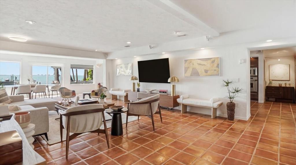 3127 Bay Shore Road Sarasota, FL 34234 - Photo 9 of 78 a view of a dining room with furniture