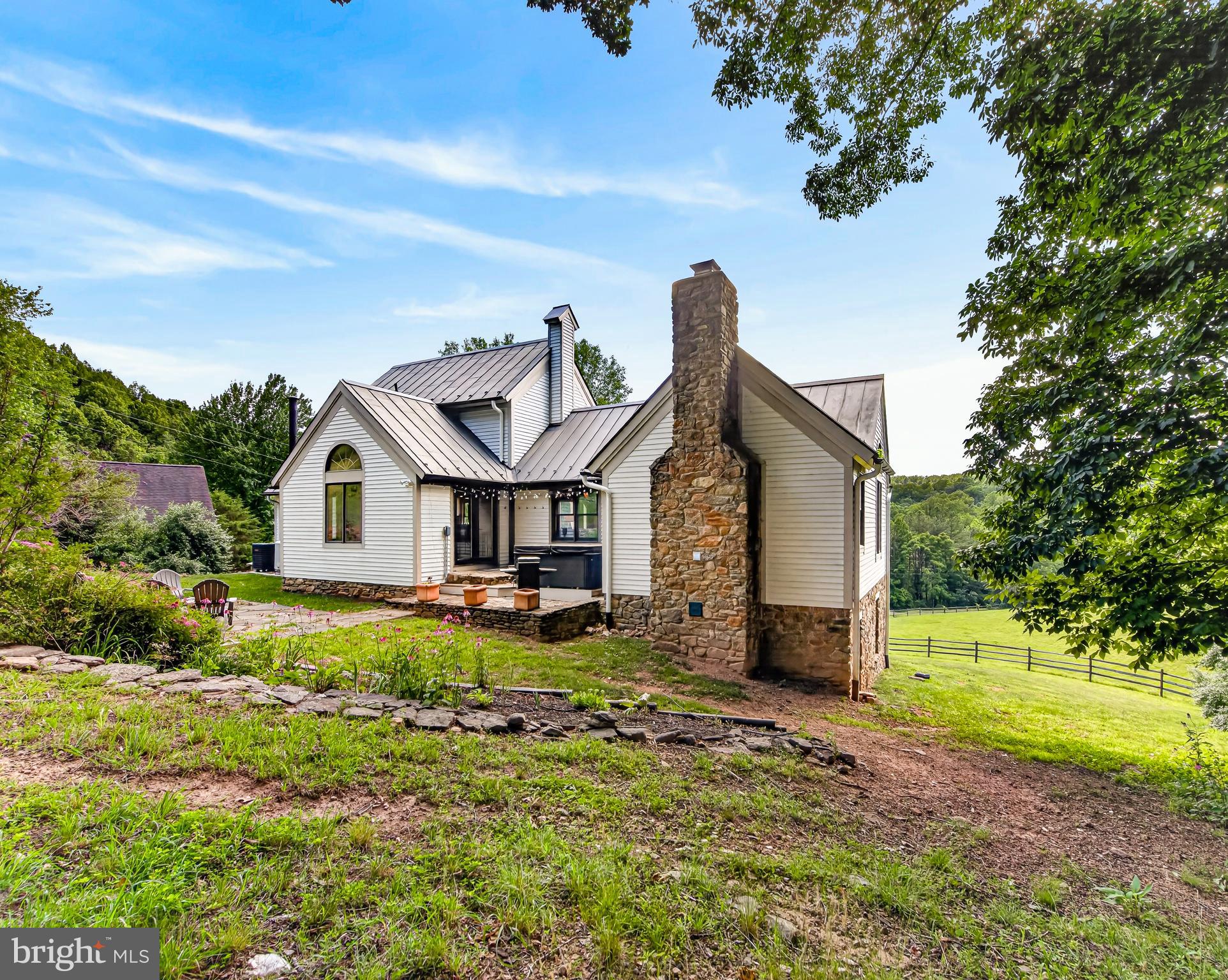 4028 South F T Valley Road Etlan, VA 22719 - Photo 77 of 101 a front view of a house with garden