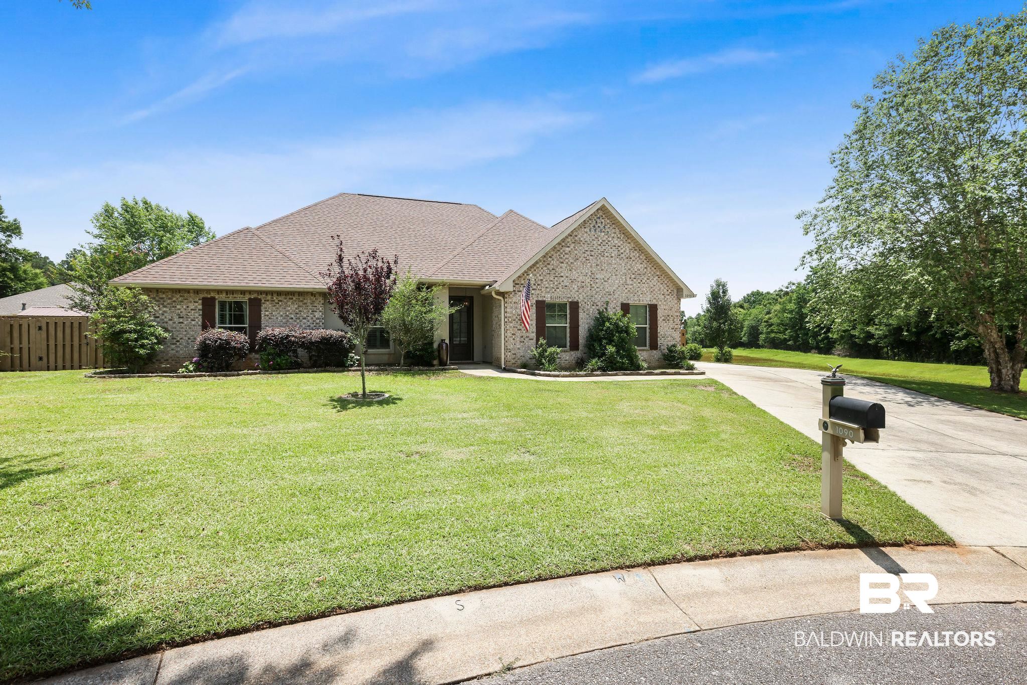 1090 Destin Avenue Foley, AL 36535 - Photo 2 of 30 View of front of home featuring brick siding and driveway