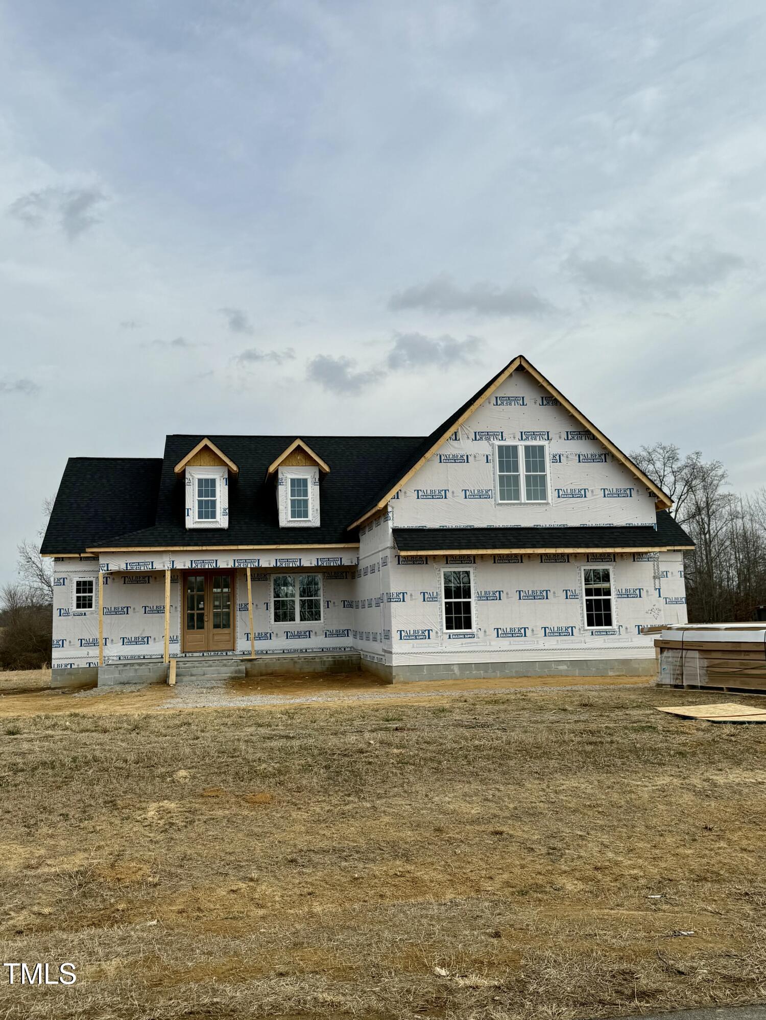 5601 River Buck Rd Spring Spring Hope, NC 27882 - Photo 1 of 4 a front view of a house with swimming pool