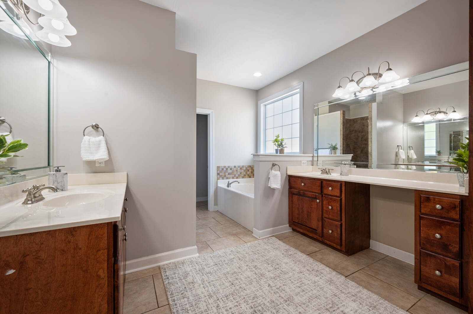 3036 Viewpointe Way Columbia, TN 38401 - Photo 26 of 35 a spacious bathroom with a double vanity sink double and mirror