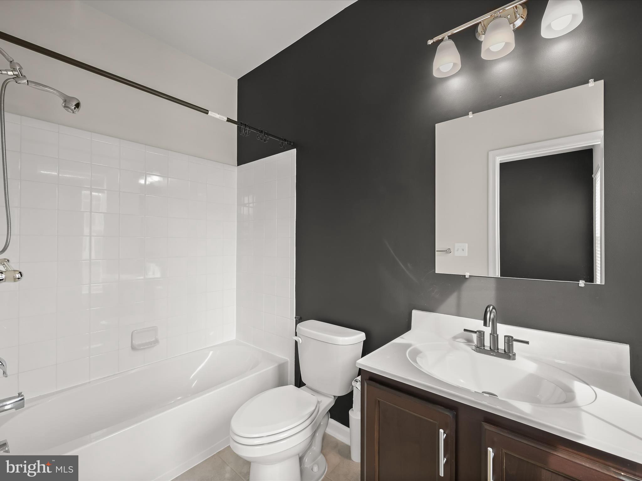 2612 Hardaway Circle Hanover, MD 21076 - Photo 20 of 29 a bathroom with a sink toilet vanity and shower