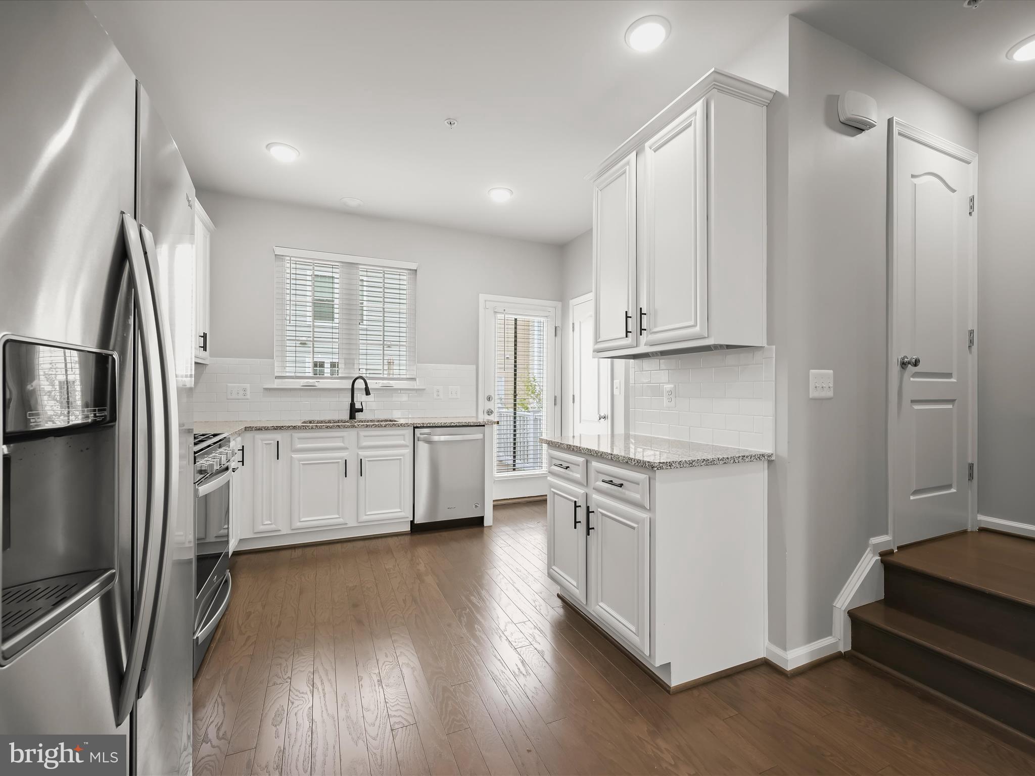 2612 Hardaway Circle Hanover, MD 21076 - Photo 10 of 29 a kitchen with stainless steel appliances a refrigerator sink and cabinets