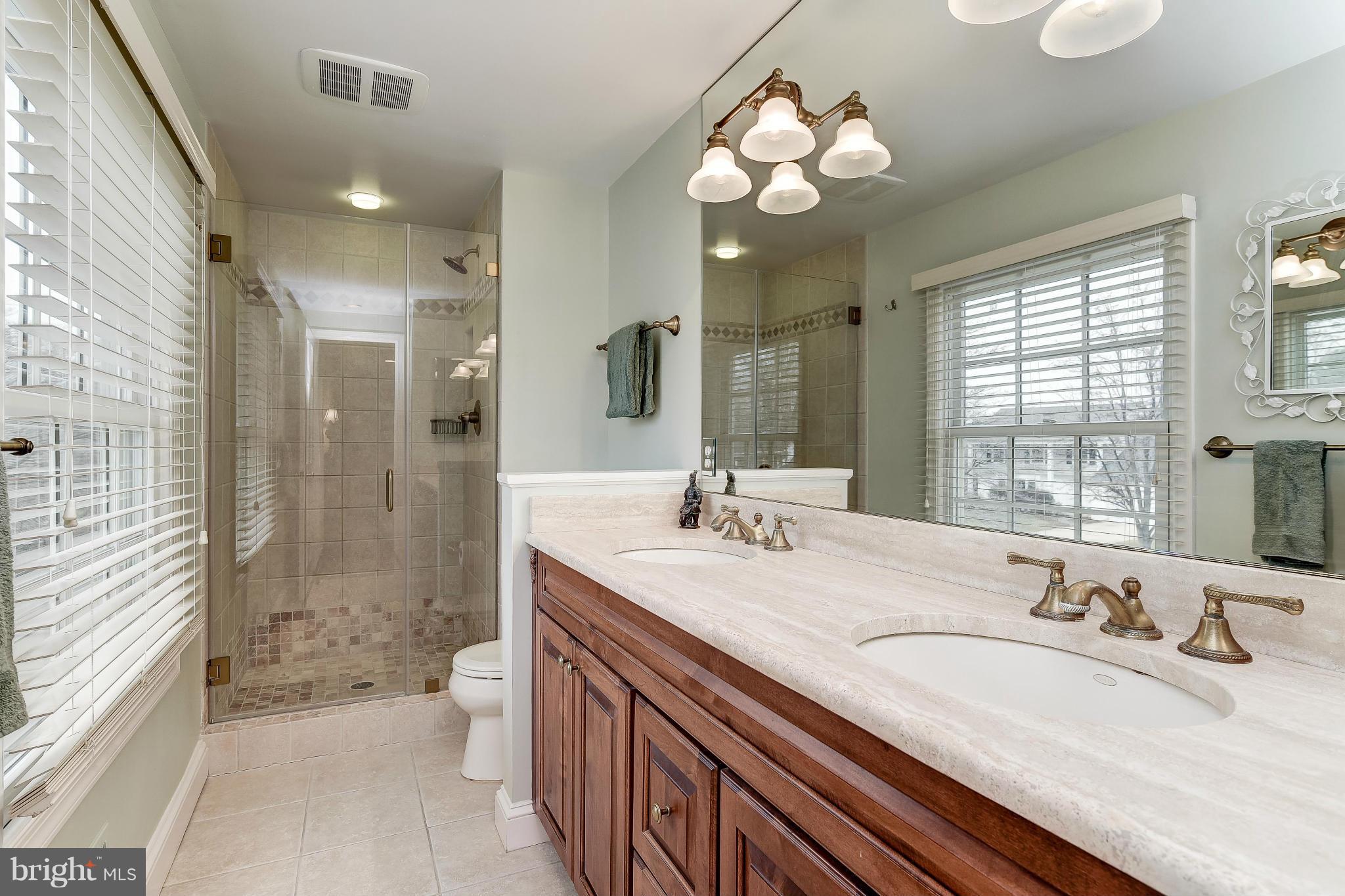9204 Wooden Bridge Road Potomac, MD 20854 - Photo 12 of 22 Renovated Owner's Bath