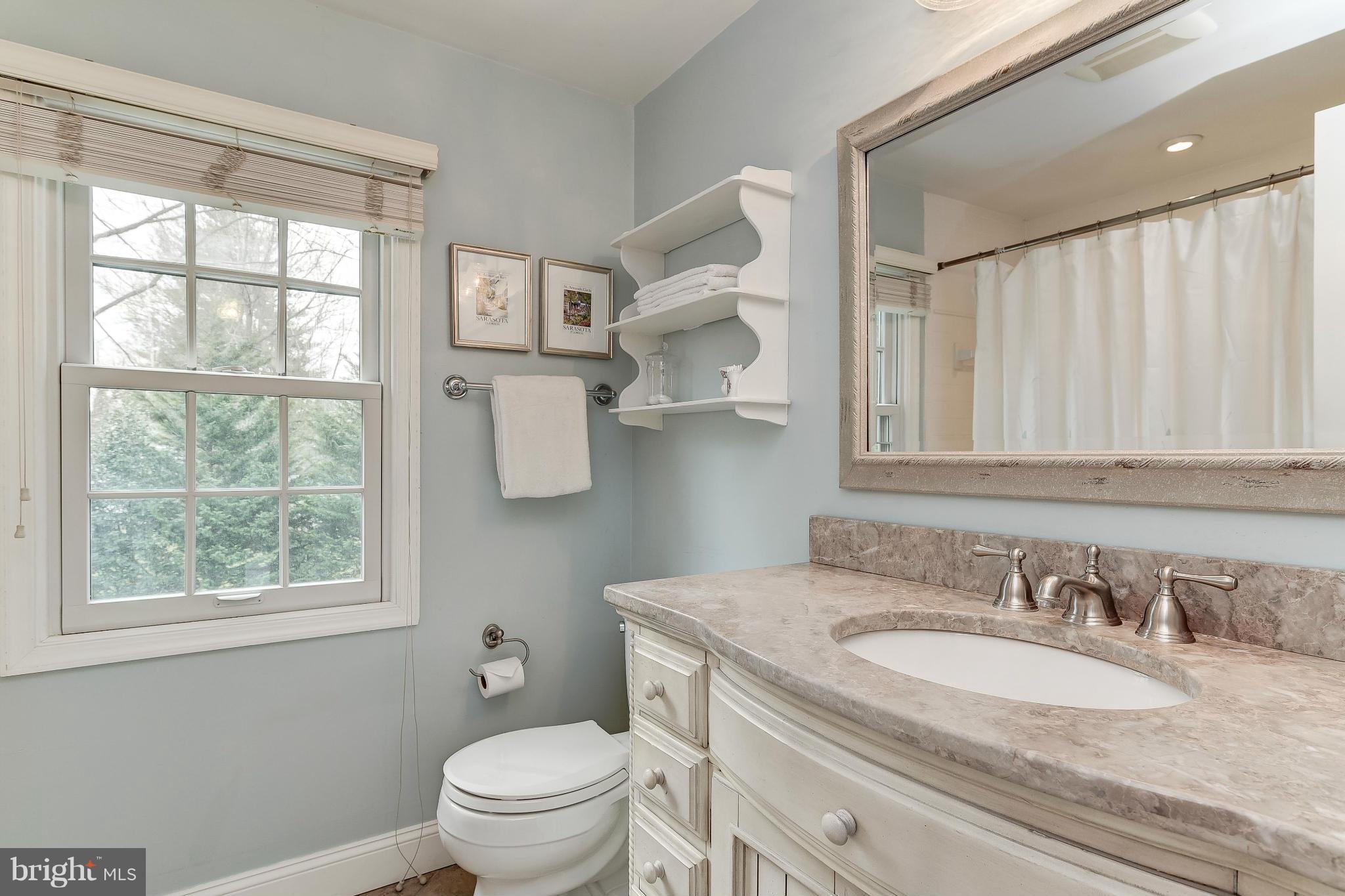 9204 Wooden Bridge Road Potomac, MD 20854 - Photo 14 of 22 Renovated Hall Bath