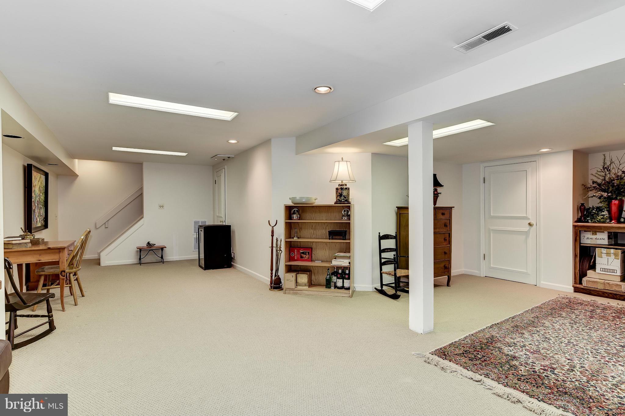 9204 Wooden Bridge Road Potomac, MD 20854 - Photo 17 of 22 Finished Lower Level with Rec Room