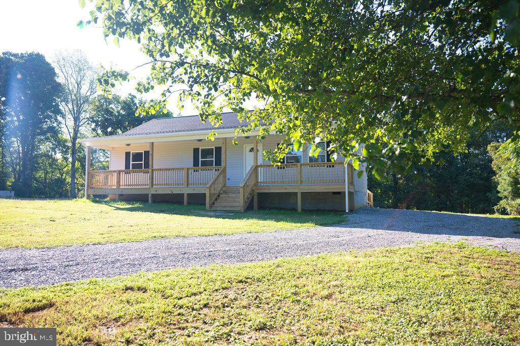 100 Bumpass Road Bumpass, VA 23024 - Photo 2 of 16 a view of a house with a yard