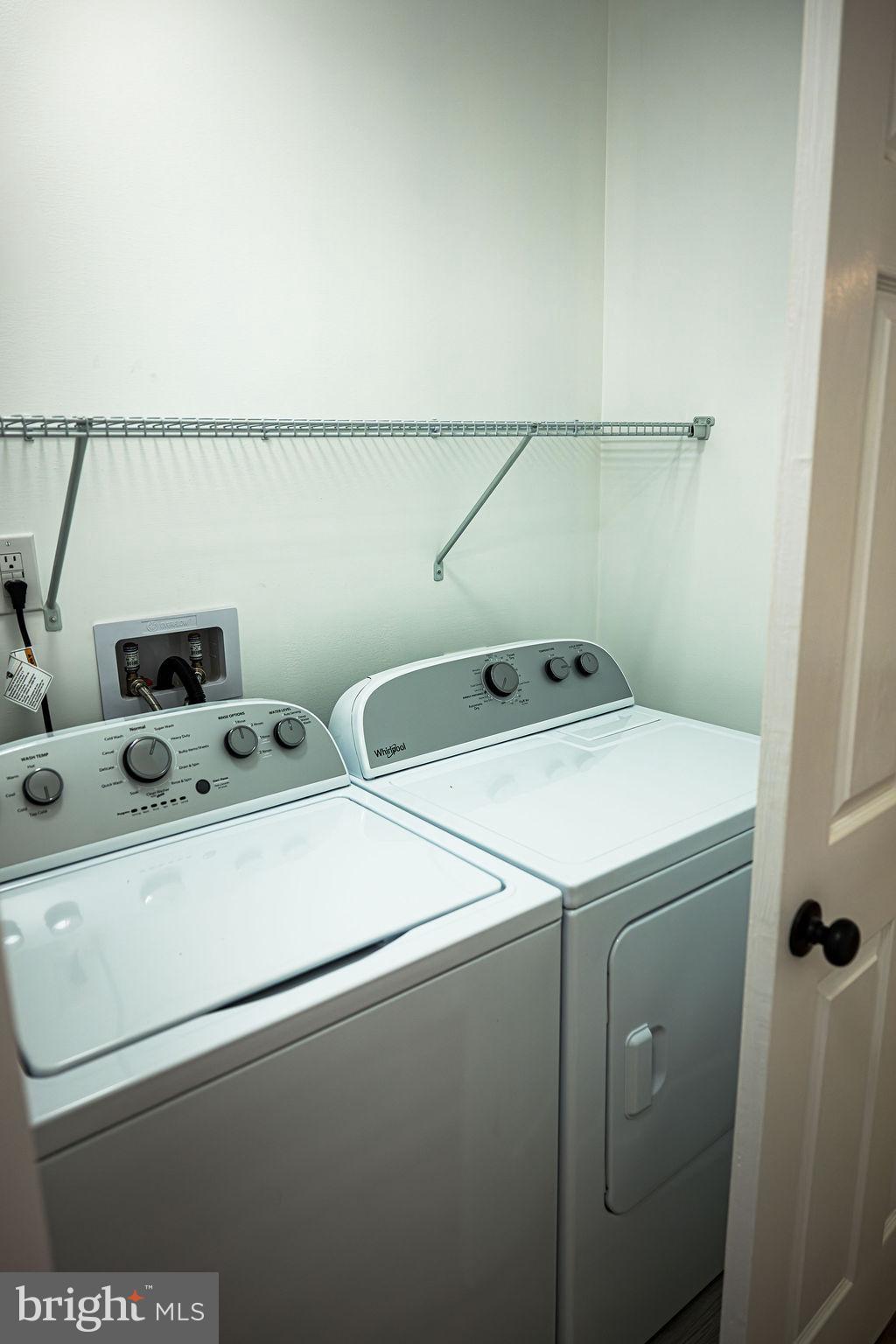 100 Bumpass Road Bumpass, VA 23024 - Photo 9 of 16 a utility room with dryer and washer