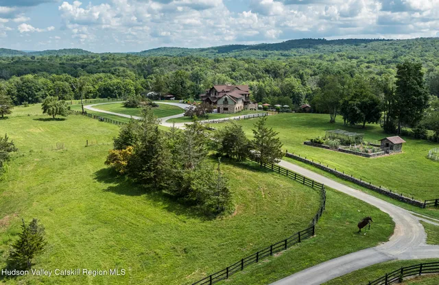 a kitchen with a stove a sink and a wooden cabinets