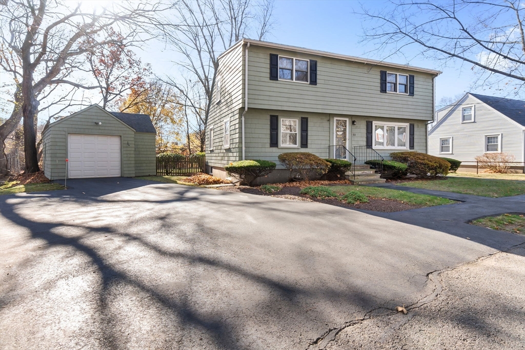 33 Proctor Circle Peabody, MA 01960 - Photo 1 of 42 a view of a house with a yard