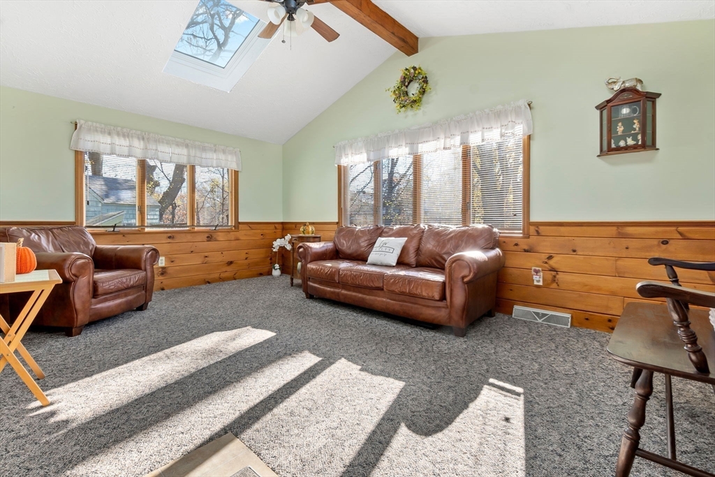 33 Proctor Circle Peabody, MA 01960 - Photo 13 of 42 a living room with furniture and a large window
