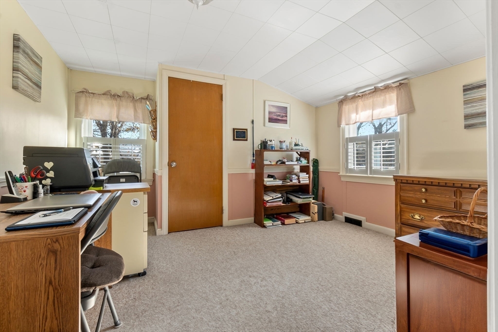 33 Proctor Circle Peabody, MA 01960 - Photo 34 of 42 a view of a livingroom with a workspace