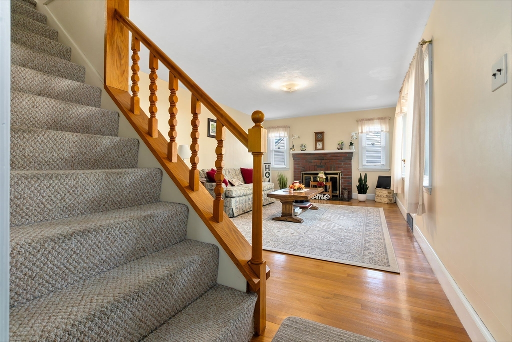 33 Proctor Circle Peabody, MA 01960 - Photo 4 of 42 a view of entryway and hall with wooden floor