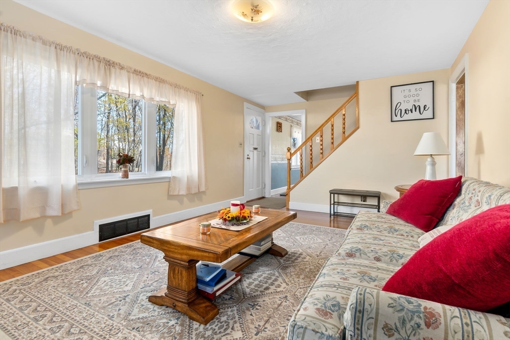 33 Proctor Circle Peabody, MA 01960 - Photo 5 of 42 a living room with furniture and a window