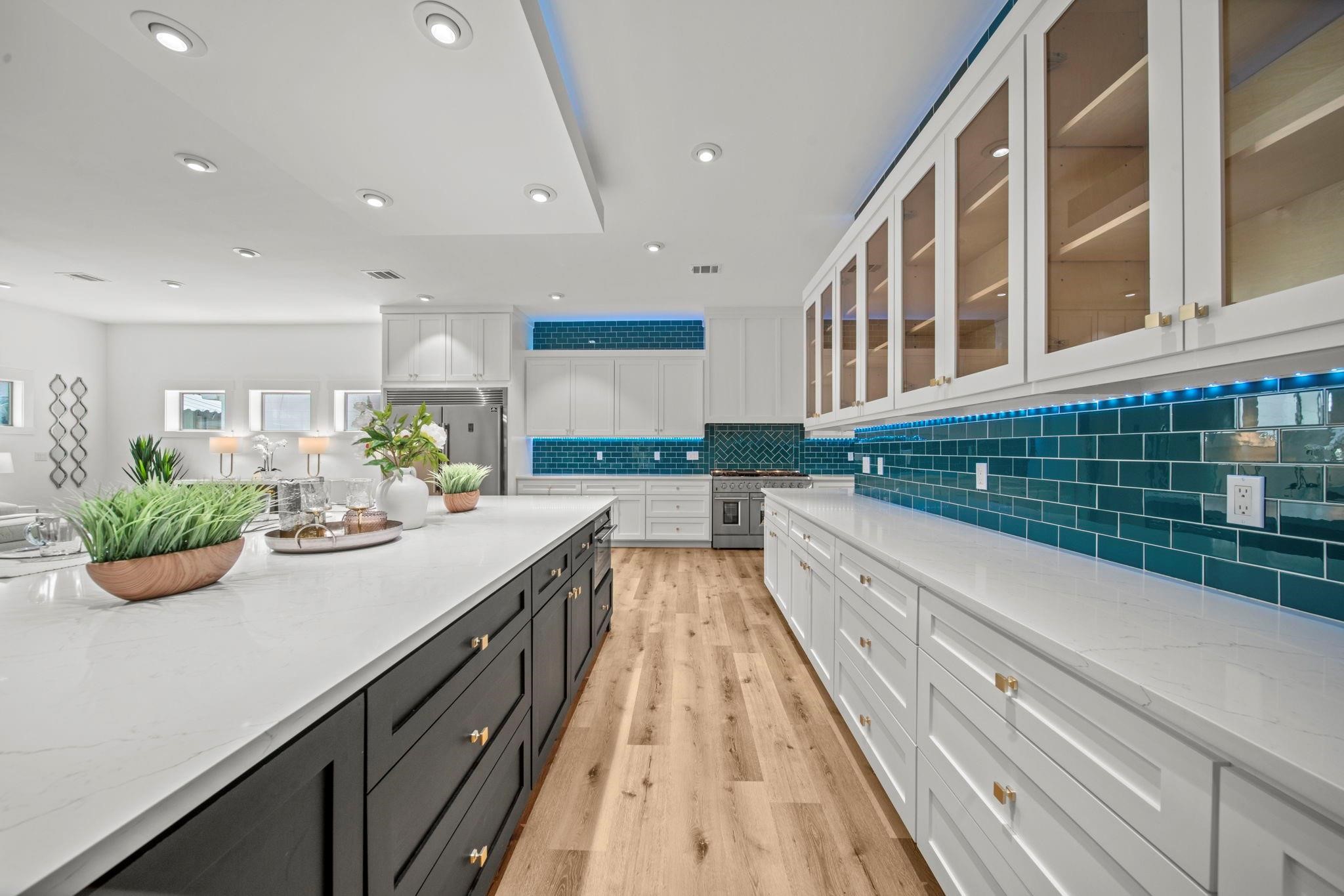 601 Cottage Street Houston, TX 77009 - Photo 20 of 48 Stainless steel appliances, quartz countertops and lots of storage.