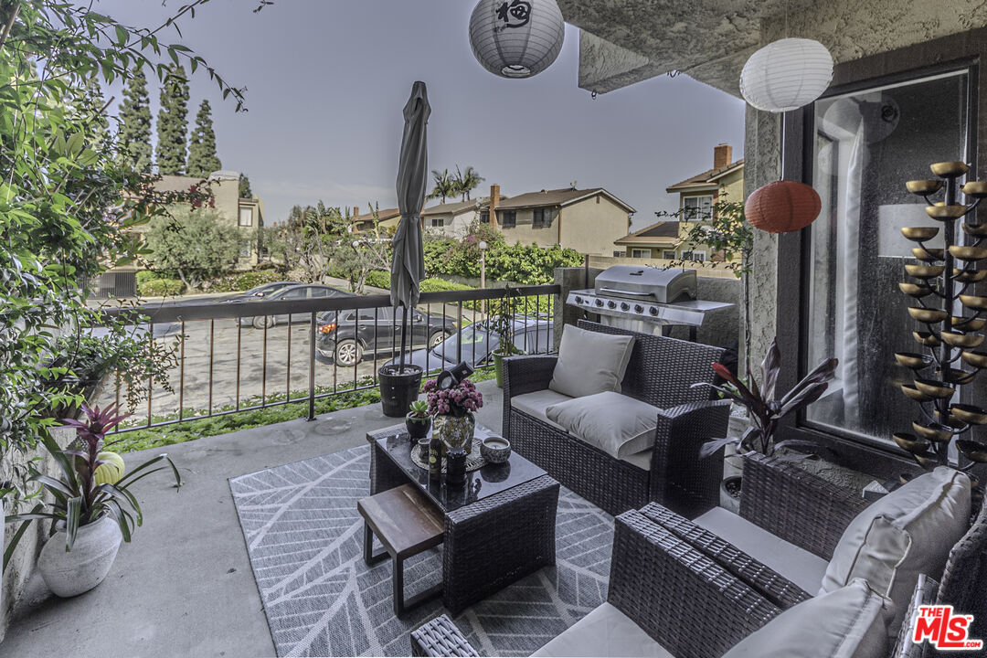 849 East Victoria Street, Unit 101 Carson, CA 90746 - Photo 3 of 19 a outdoor living space with patio furniture