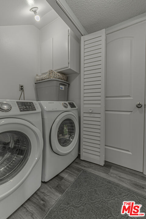 849 East Victoria Street, Unit 101 Carson, CA 90746 - Photo 7 of 19 a utility room with dryer and washer