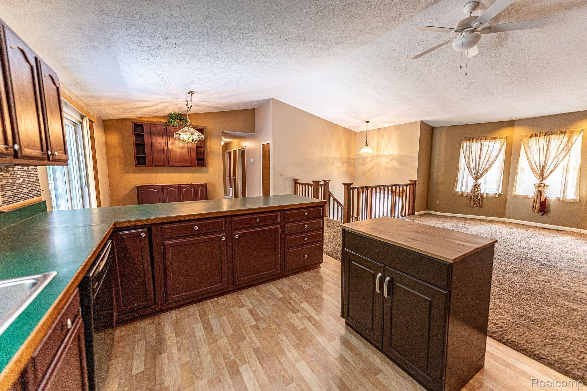 7881 Oak Grove Road Howell, MI 48855 - Photo 19 of 31 Kitchen to living rm .jpeg