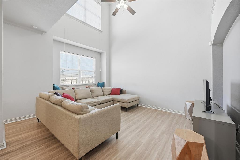 6913 Sandshell Boulevard Fort Worth, TX 76137 - Photo 15 of 24 a living room with furniture and a window