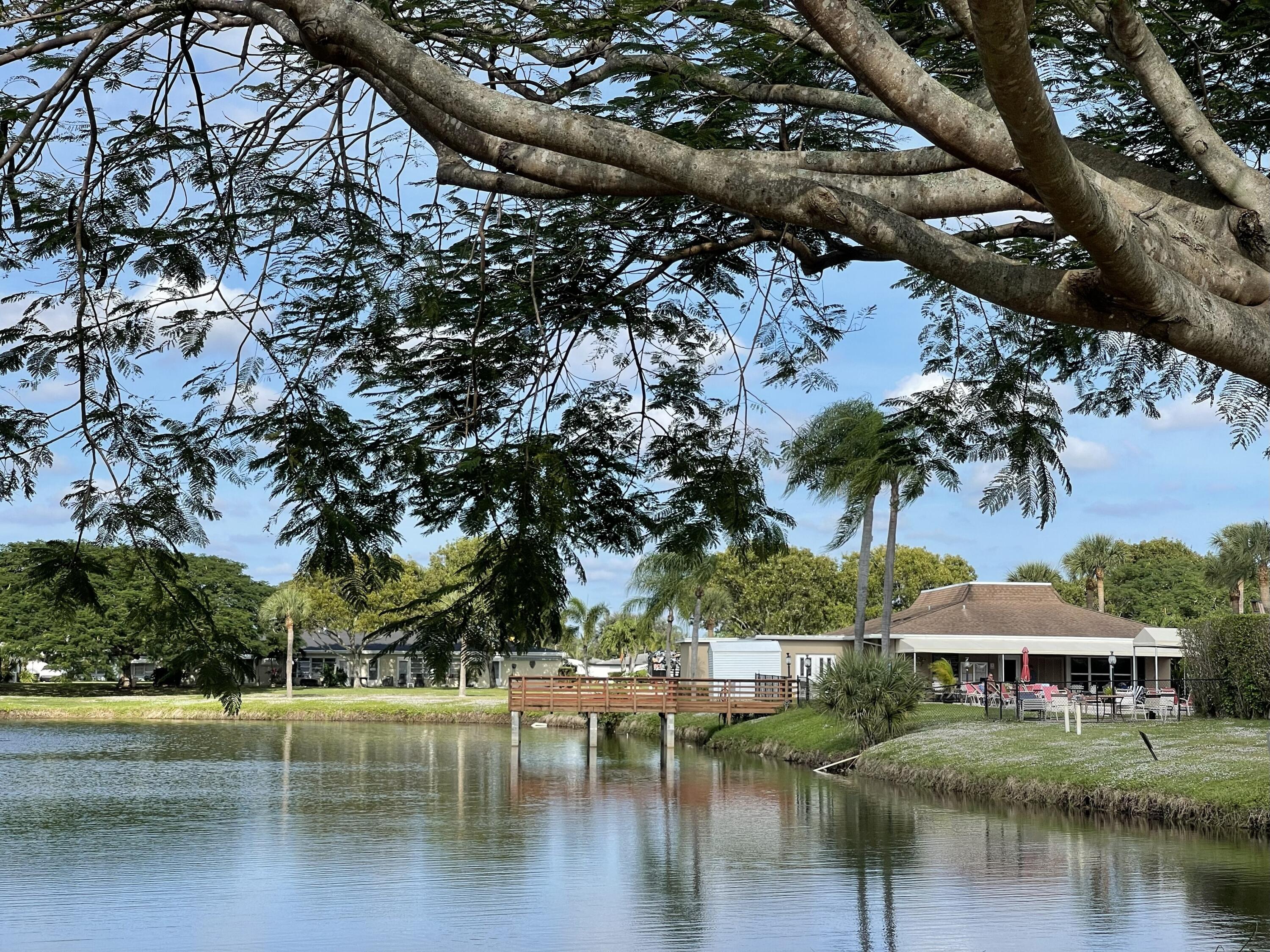 680 High Point Boulevard North, Unit C Delray Beach, FL 33445 - Photo 20 of 26 001_Clubhouse on the Lake
