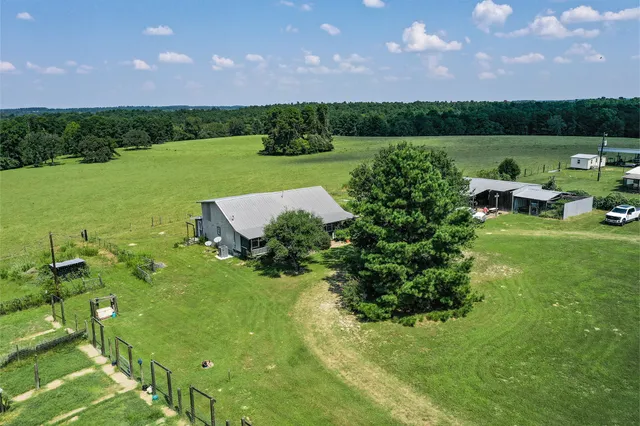 a view of a garden with an outdoor space