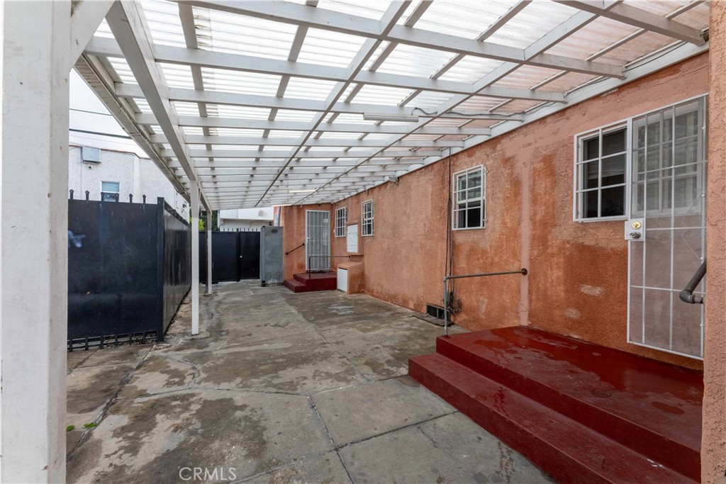 2000 Pacific Long Beach, CA 90806 - Photo 12 of 51 a view of a hallway with wooden walls
