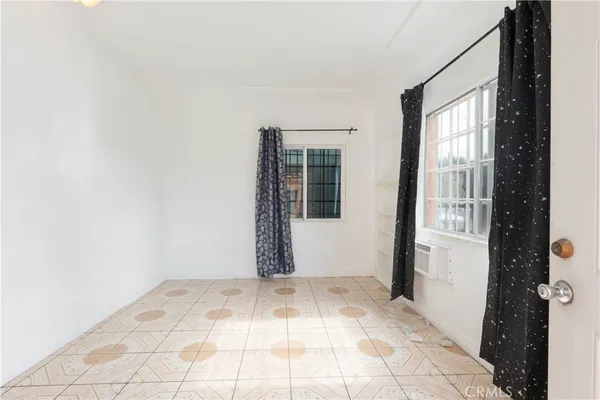 a view of a room with a window