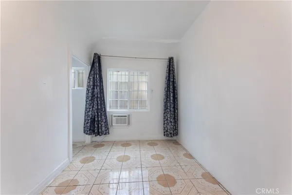 a kitchen with a stove and a sink