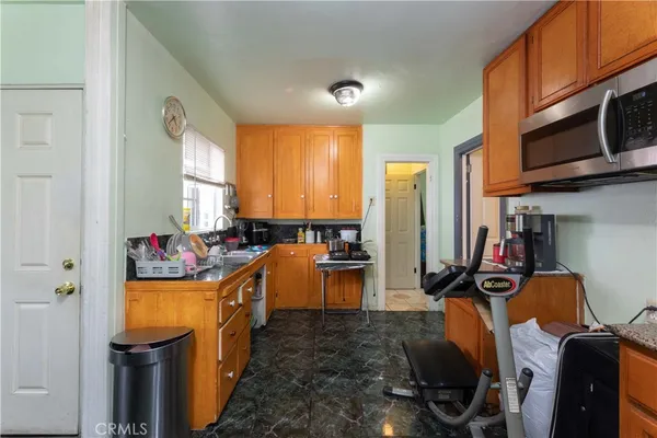 a room with furniture and a flat screen tv