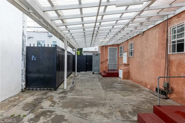a view of a livingroom with furniture and toys