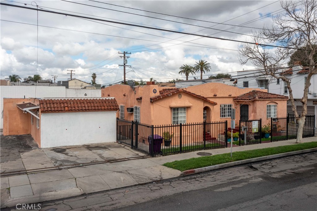 2000 Pacific Long Beach, CA 90806 - Photo 4 of 51 a view of a white house with a street