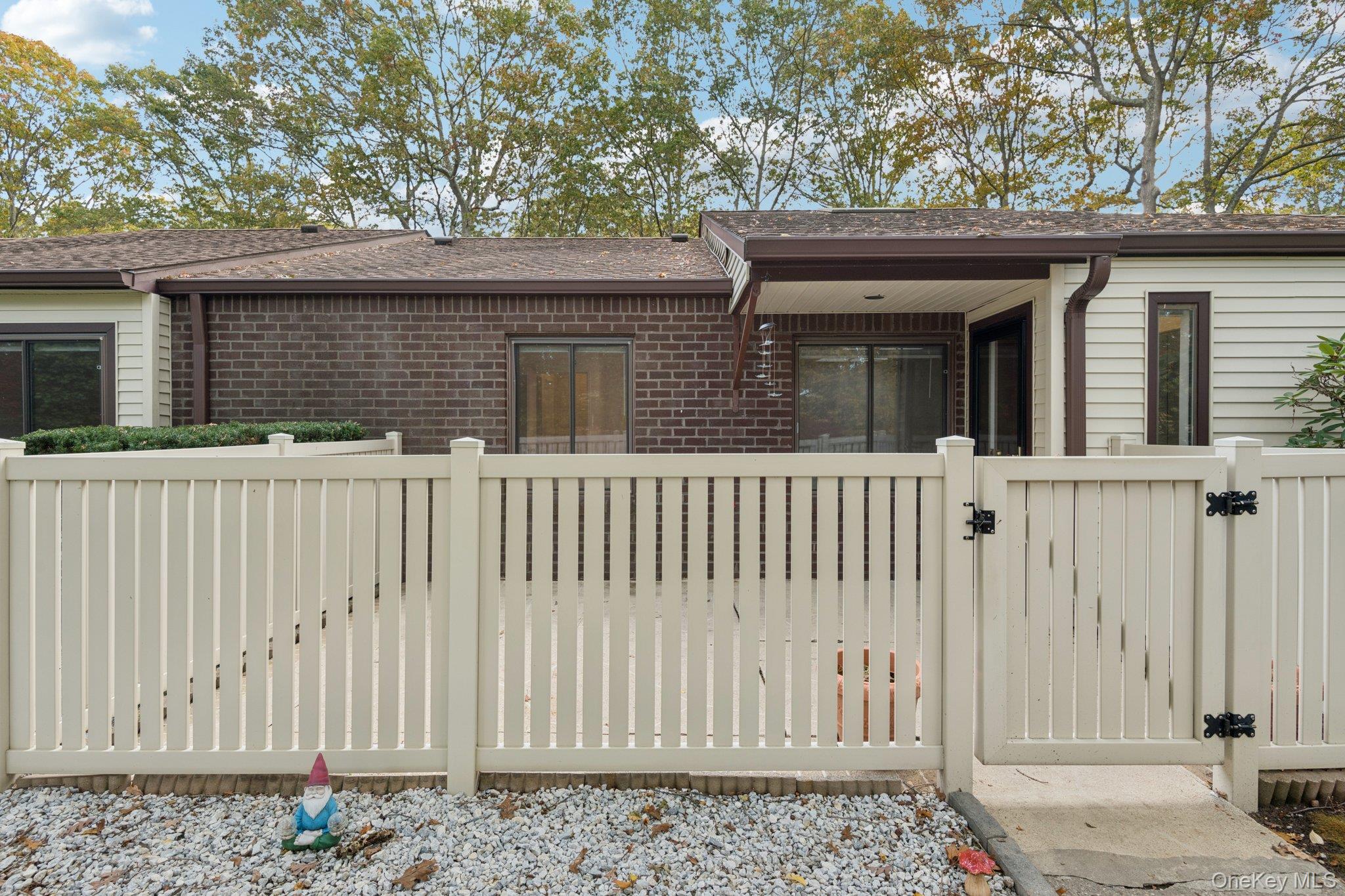 99 Birchwood Road Coram, NY 11727 - Photo 1 of 1 a side view of a house with a fence