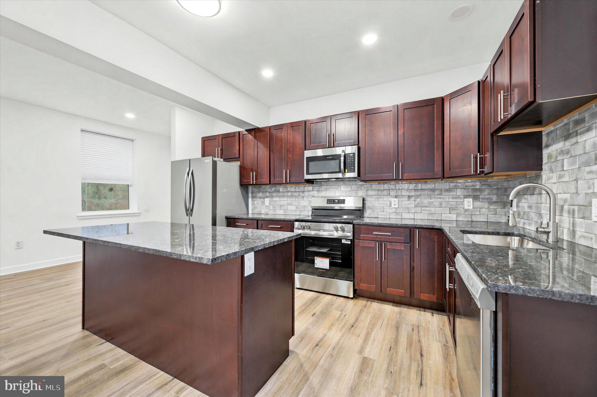 514 Ryers Avenue, Unit A Cheltenham, PA 19012 - Photo 6 of 18 Modern kitchen with sleek finishes.