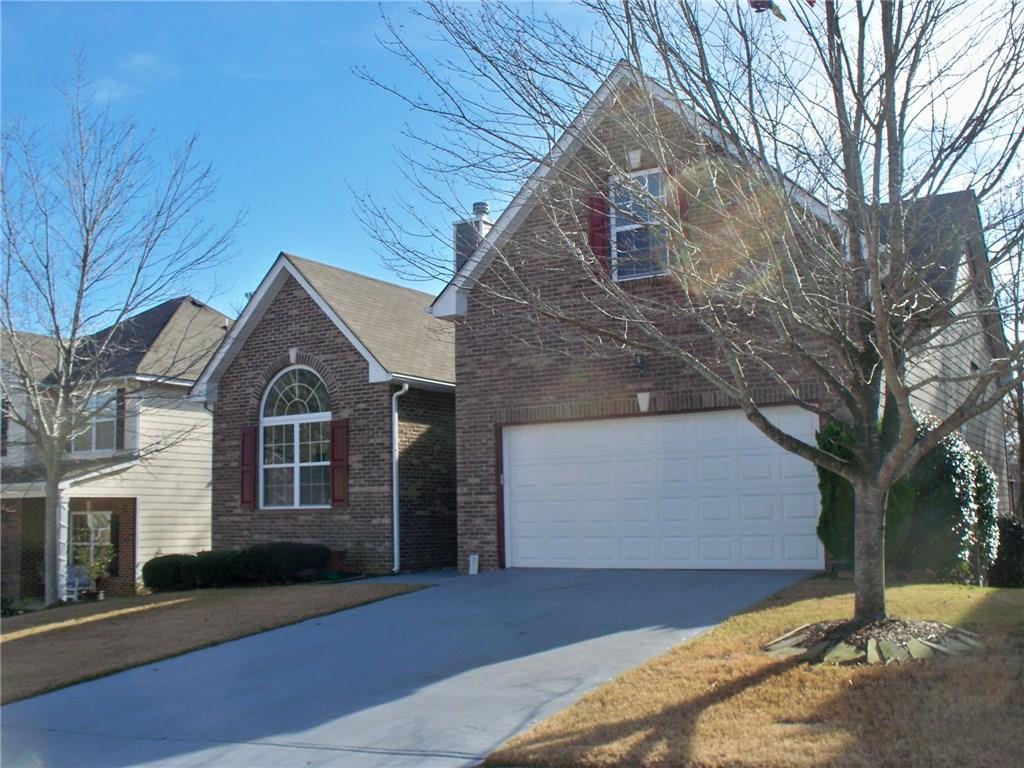 680 Moonlight Way Suwanee, GA 30024 - Photo 1 of 1 Brick home with new garage door