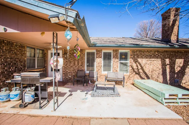 a view of house with outdoor seating space