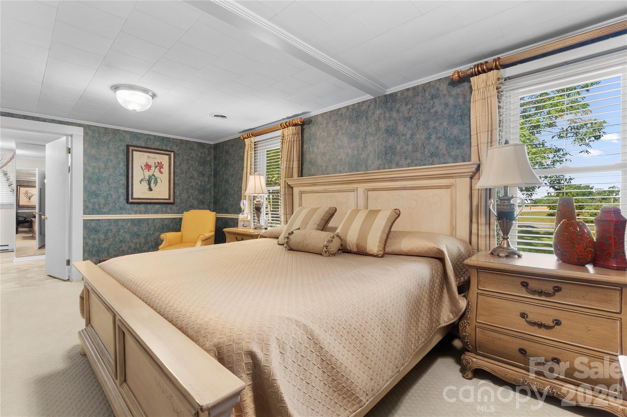 1687 Sexton Road, Unit 5 Denton, NC 27239 - Photo 14 of 48 a bedroom with a large bed and a dresser