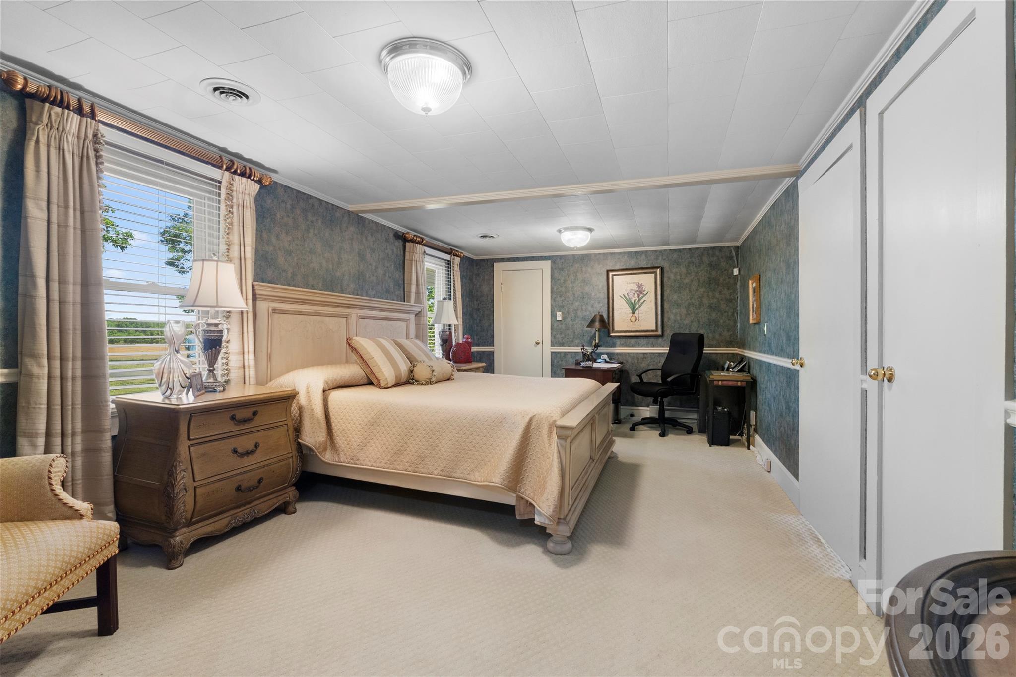 1687 Sexton Road, Unit 5 Denton, NC 27239 - Photo 15 of 48 a bed room with furniture and a window